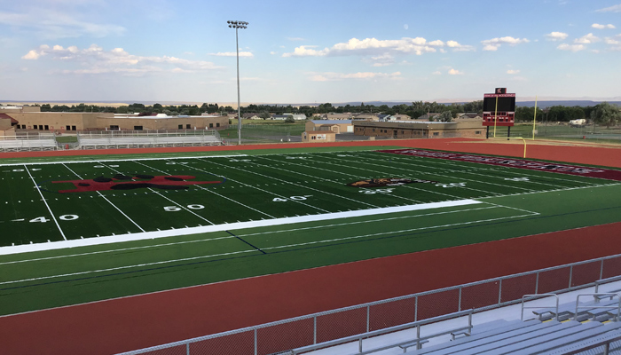 Hellas Construction crews are at Riverton High School in Wyoming wrapping up installation of the new Matrix Turf with Helix Technology and Comfort Coat™ pad, along with the epiQ Tracks® X1000 track surface scheduled for completion next week.